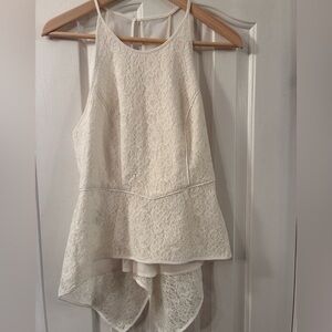 BCBG lace peplum style sleeveless blouse